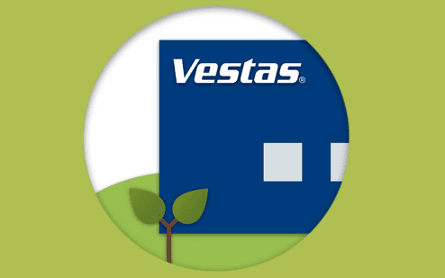 Logo von Vestas in blau mit wei&szlig;en Fenstern, umgeben von gr&uuml;nen Bl&auml;ttern und einer sanften Landschaft.